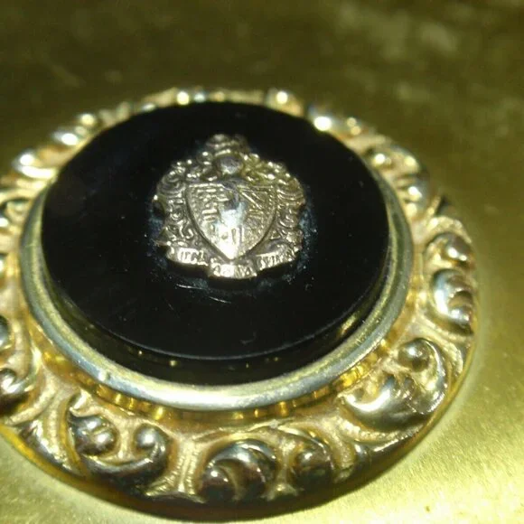 Gold Guild Compact with Sterling and Onyx Emblem.